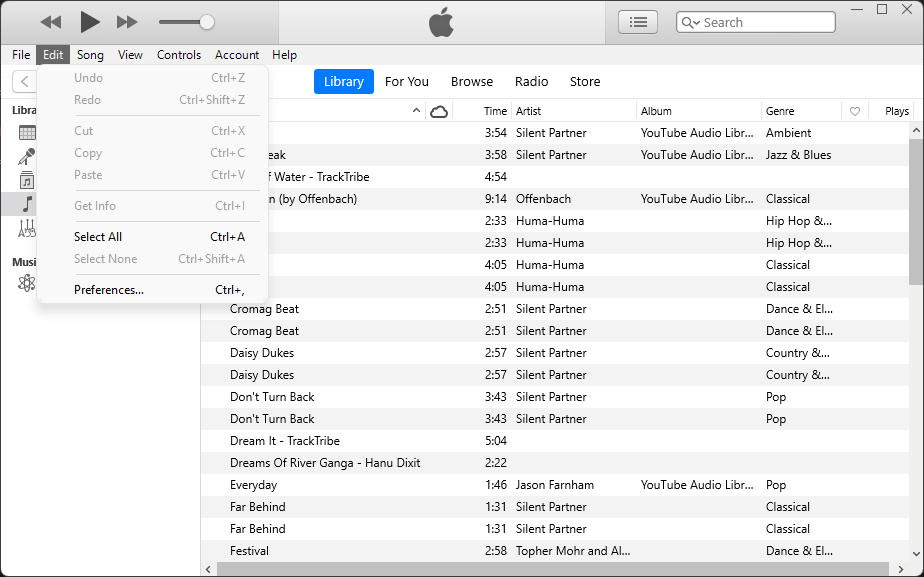 clicking the Edit menu in iTunes displaying the Preferences option