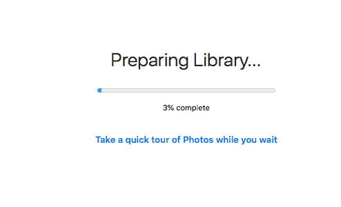 the Photos app is preparing library